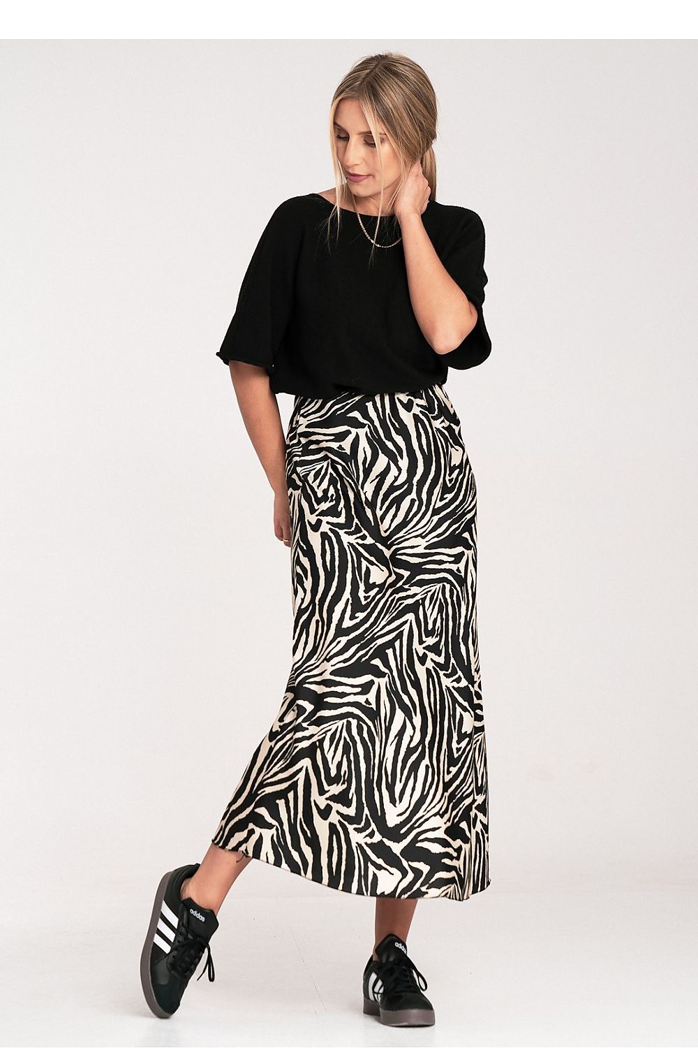 Stylish display of Figl's luxury satin midi skirt, featuring detailed stitching and perfect fit for EU S/M | US S/M.