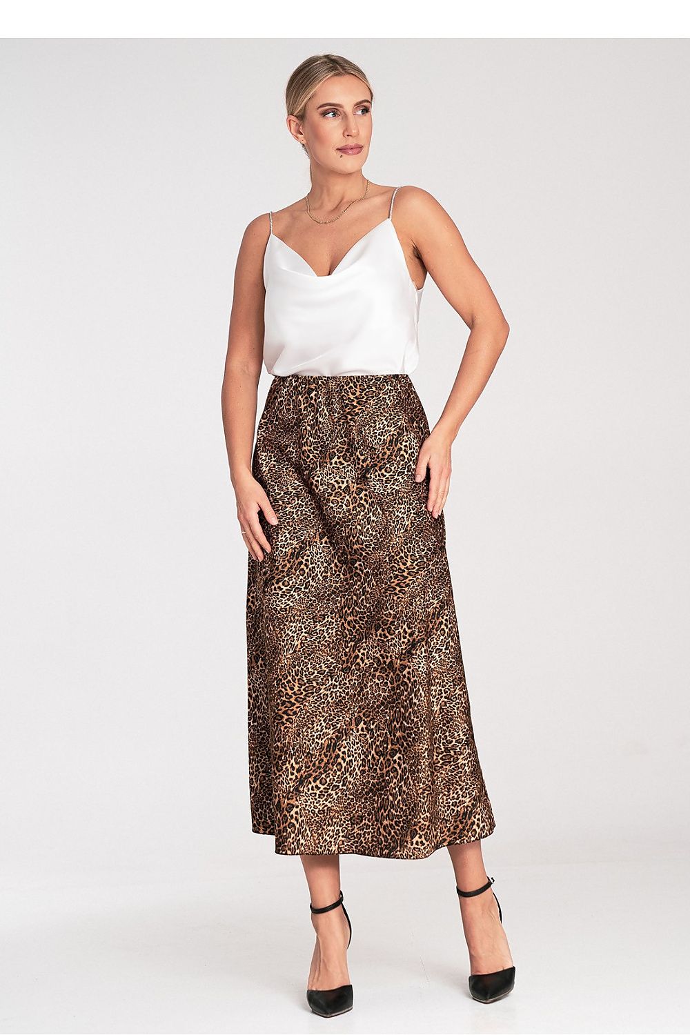 Detail view of the Figl luxury satin midi skirt, highlighting the soft texture and quality stitching of the elastic waistband.