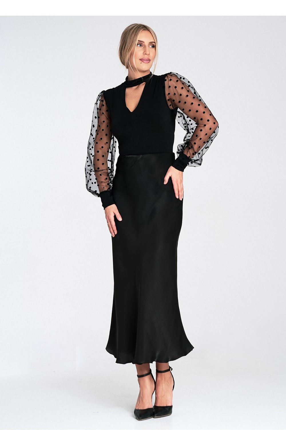 Back view of the Figl luxury satin midi skirt, emphasizing the elastic waistband and flattering silhouette.