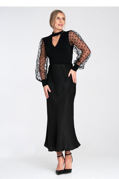 Back view of the Figl luxury satin midi skirt, emphasizing the elastic waistband and flattering silhouette.