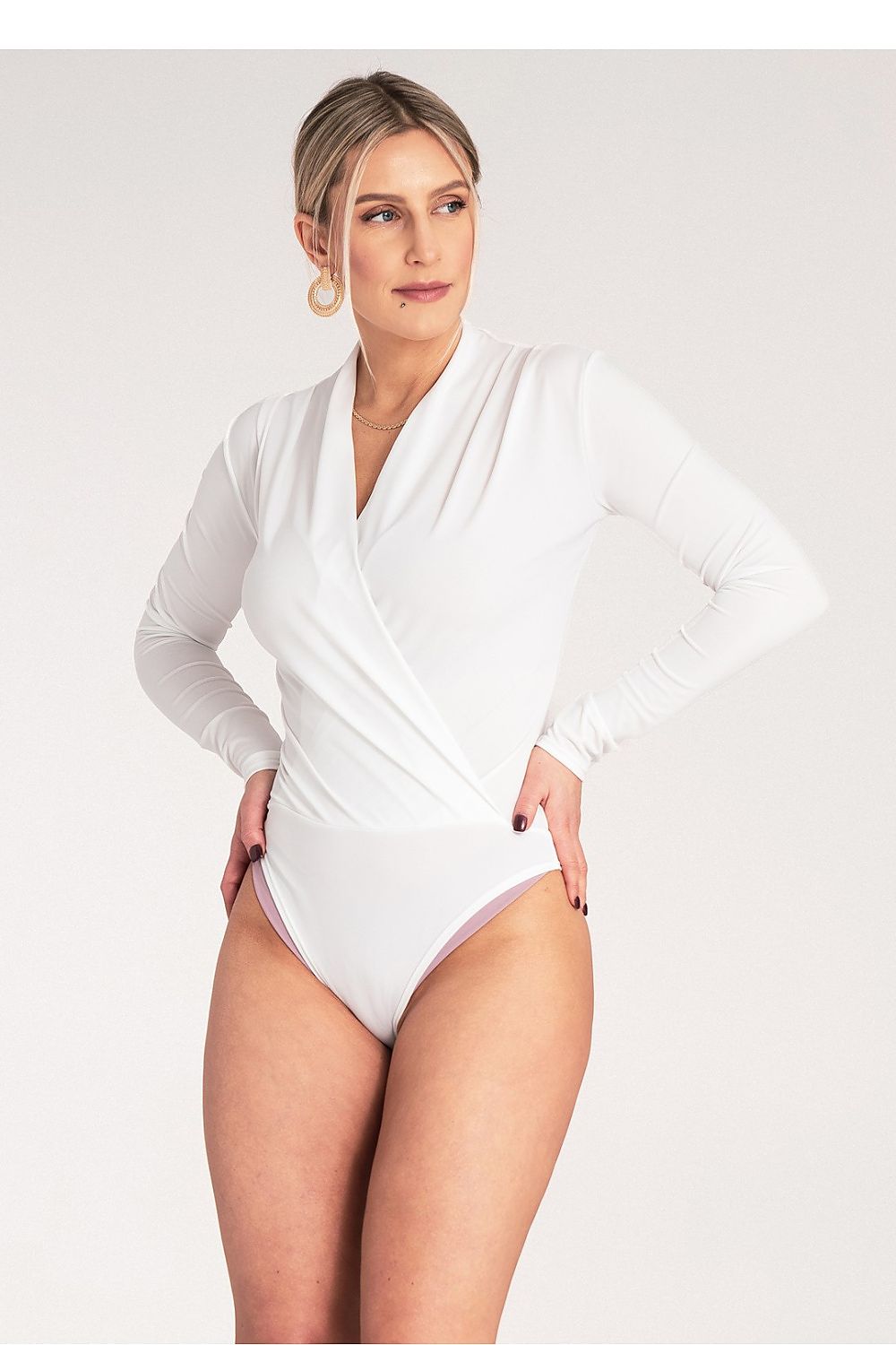 Figl's sophisticated long sleeve bodysuit in size S/M, made of 95% polyester and 5% spandex for a comfortable fit.