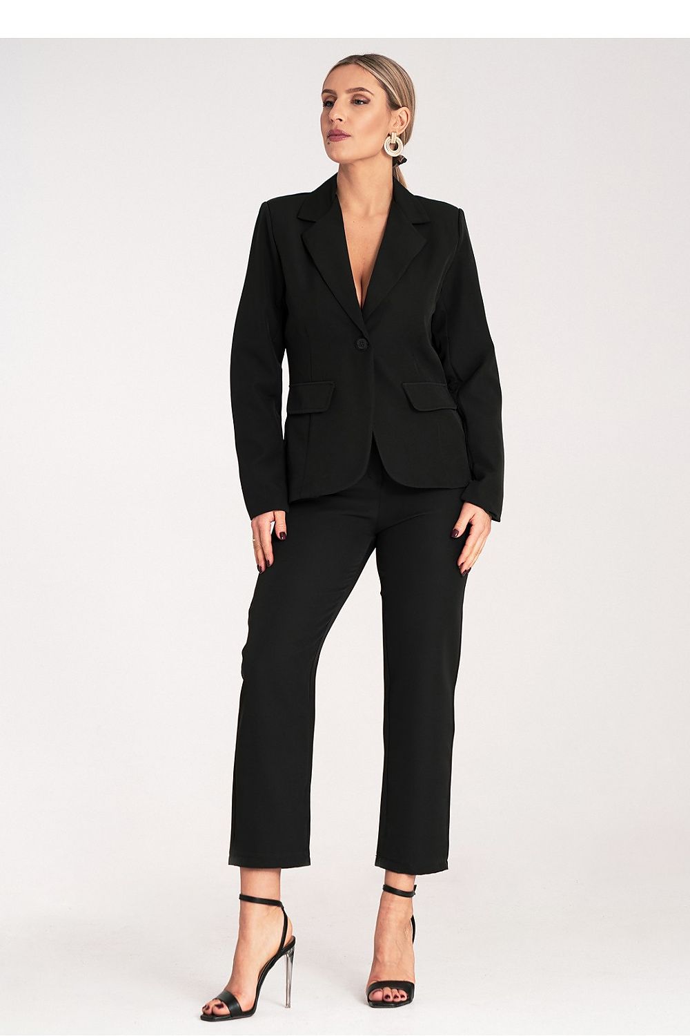 Elegant women's suit by Figl featuring a classic one-button jacket, perfectly tailored for a luxurious look.