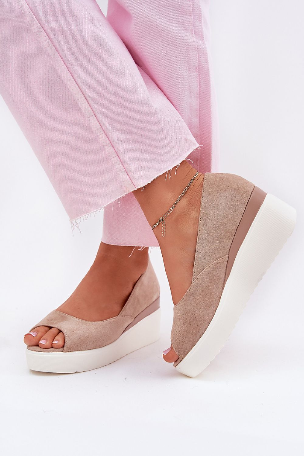 Elegantly designed eco-suede sandals for women by Step in Style, showcasing a stylish wedge heel suitable for warm days.