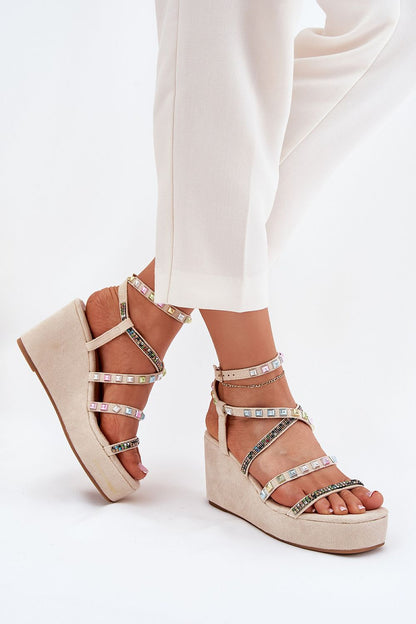 Close-up of Step in Style luxury women's wedge sandals, crafted from eco-suede with elegant embellishments for a chic summer look.