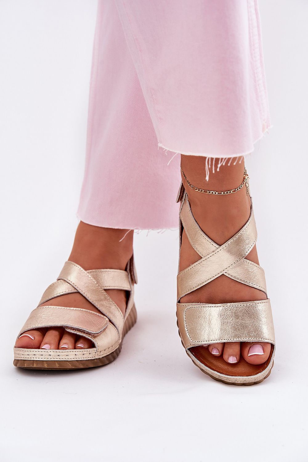 Versatile Maciejka leather sandals with a comfortable wedge heel, ideal for pairing with dresses and skirts, exclusively from Step in Style.