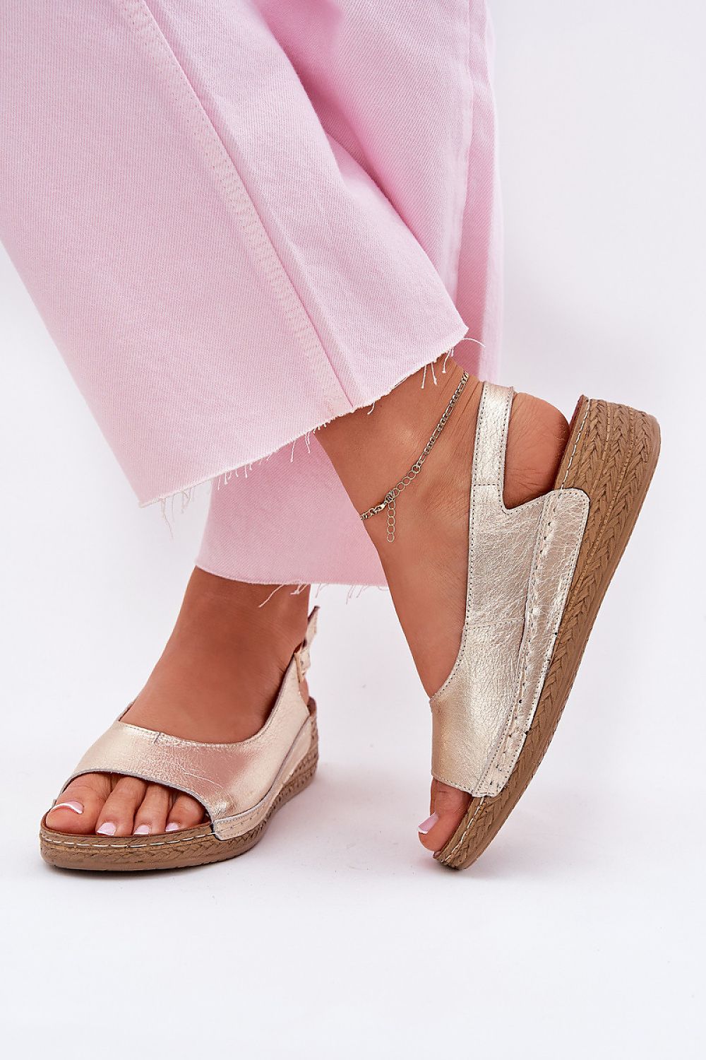 Stylish presentation of Maciejka sandals on a vibrant background, showcasing their elegant natural leather texture, offered by Step in Style.