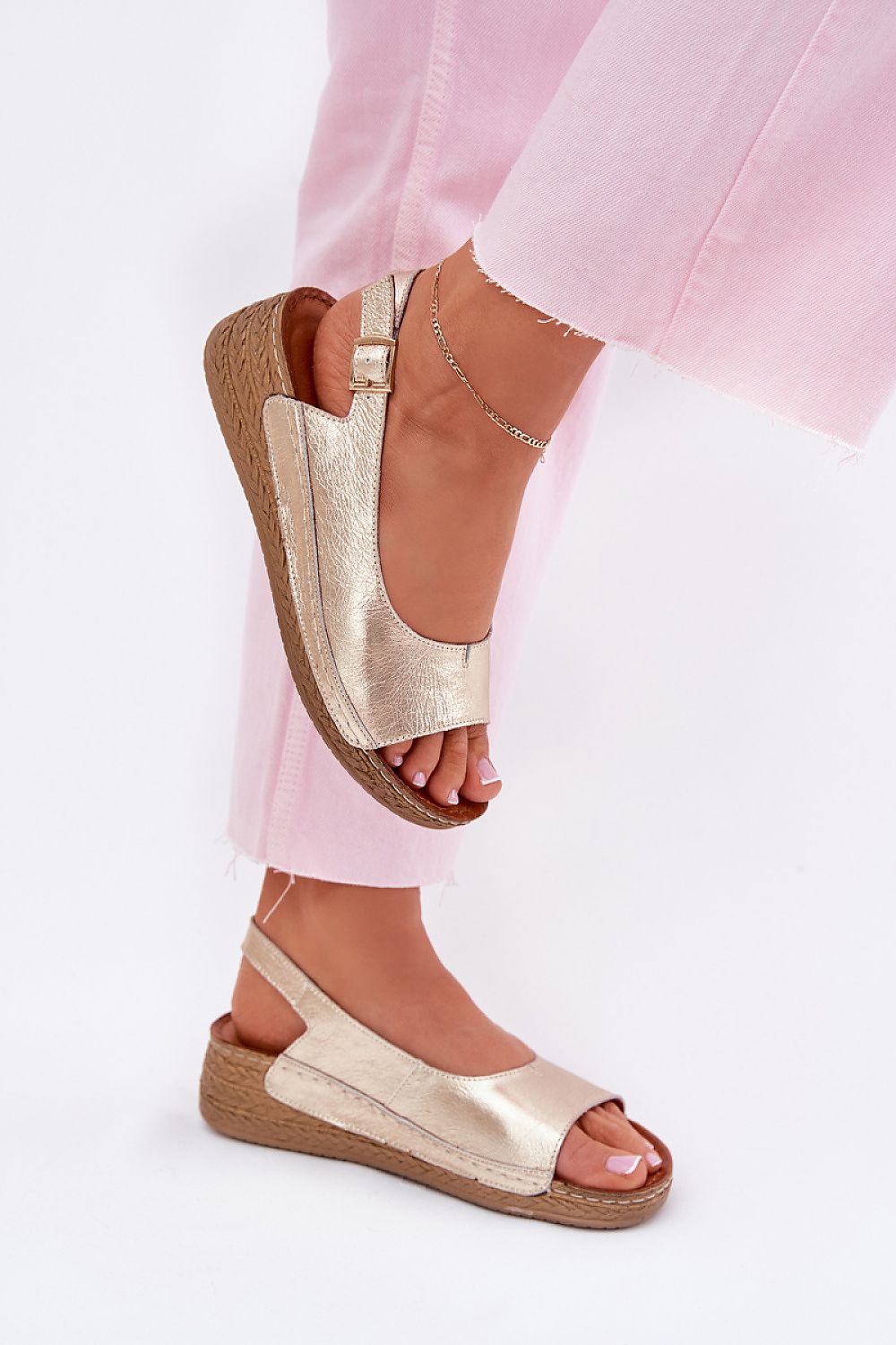 Fashionable Maciejka sandals styled with a summer dress, illustrating their versatility and elegance, designed by Step in Style.