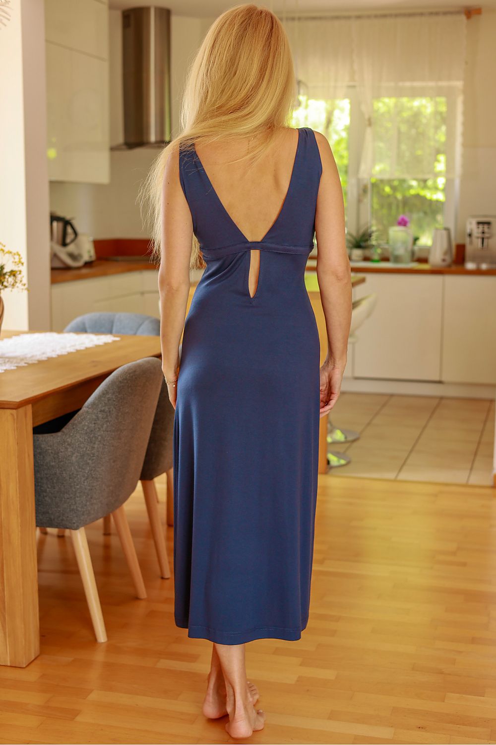 Mirale long daydress in a flowy design, perfect for warm weather, with its luxurious deep V-neck and comfortable fit.