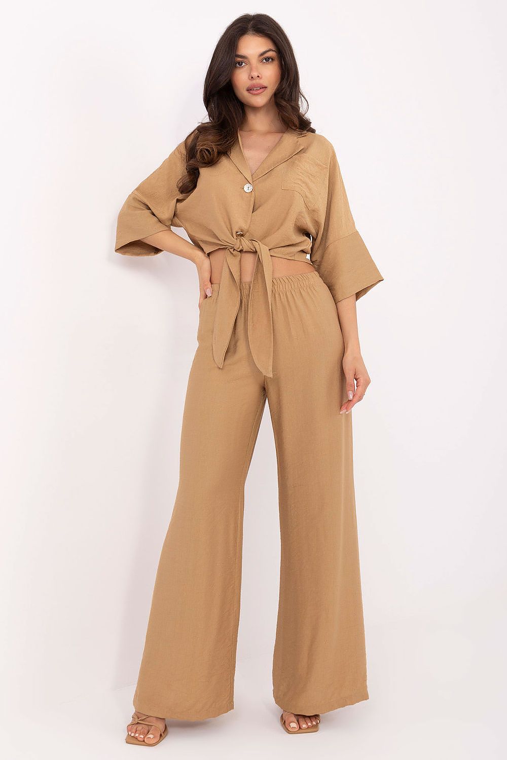 Elegant Och Bella women's set in size S featuring a lightweight viscose-nylon blend shirt and wide-legged trousers, ideal for sophisticated daily wear.