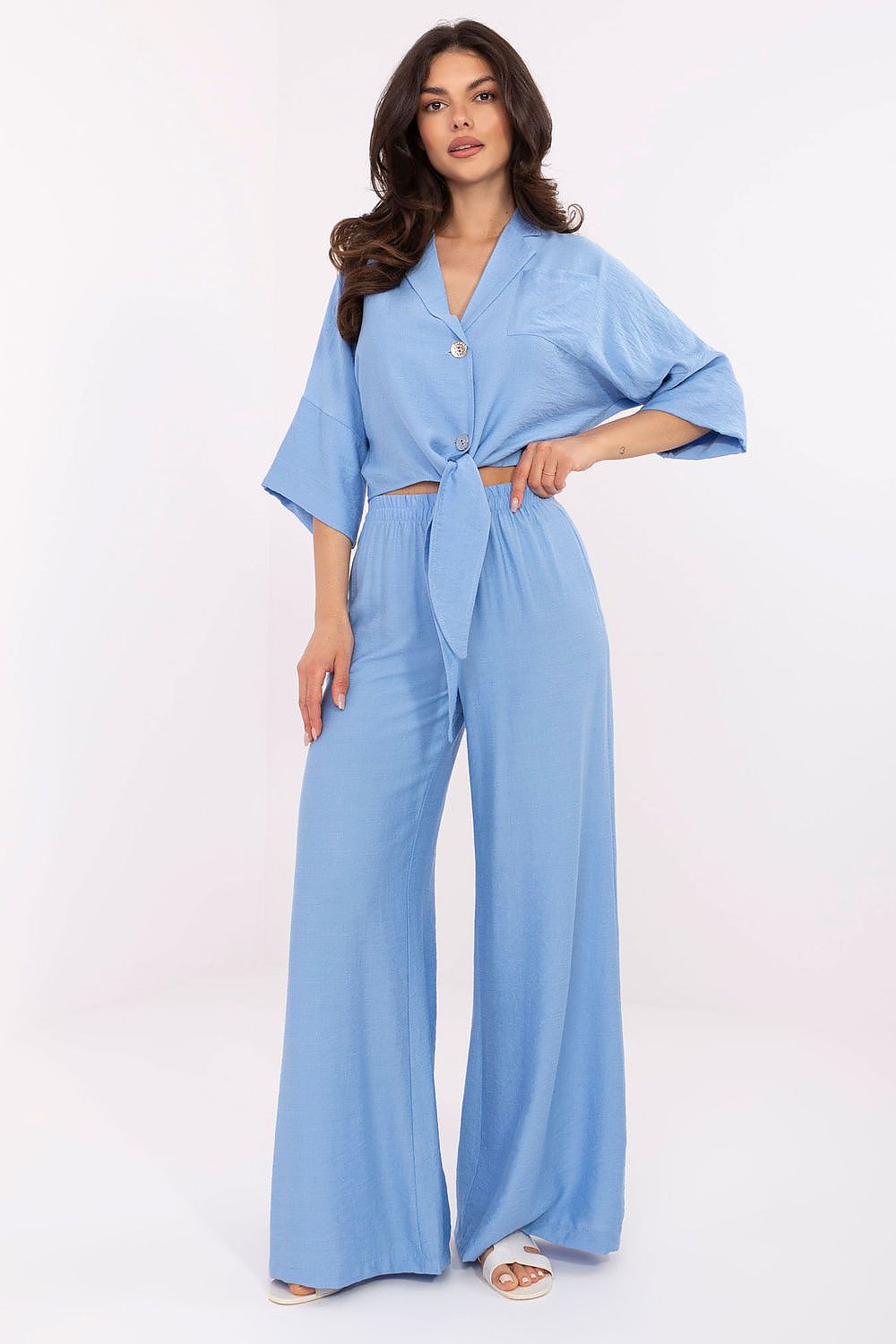 Fashionable Och Bella women's ensemble showcasing an effortless silhouette with ankle-length trousers, perfect for casual or professional outings.