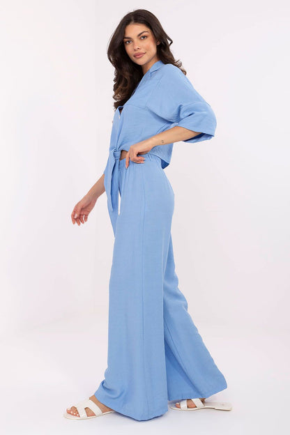 Contemporary Och Bella women's attire combining comfort with fashion; features three-quarter sleeves and a chest pocket for a stylish yet functional design.