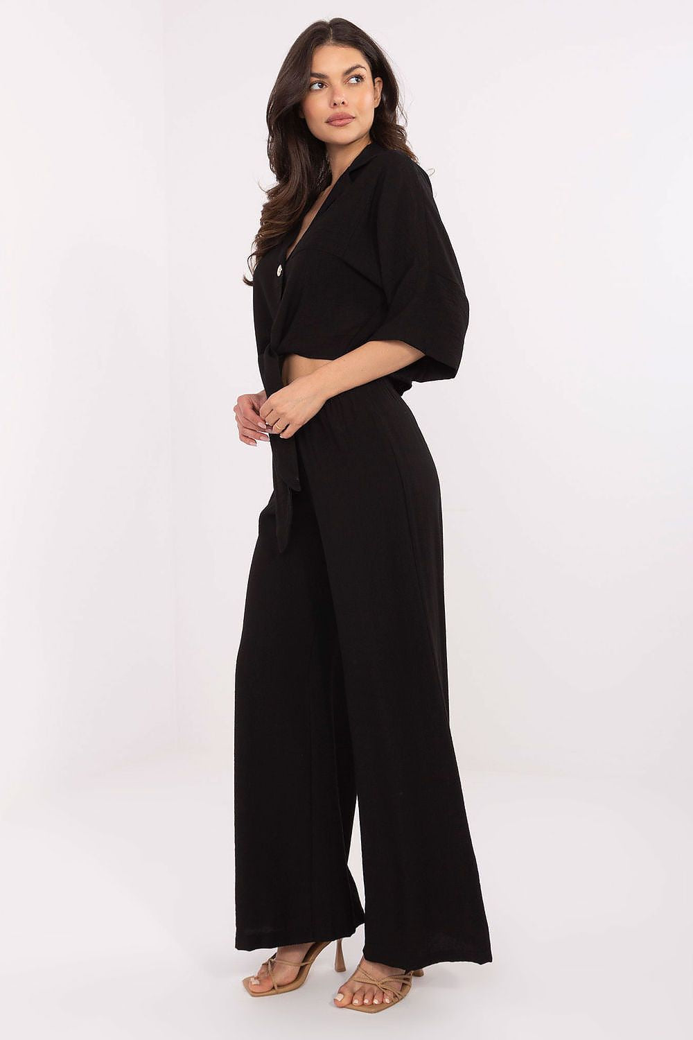 Detail of the high-waisted wide-leg pants from Och Bella Stylish Women's Set, emphasising a minimalist design and breathable fabric ideal for casual luxury.