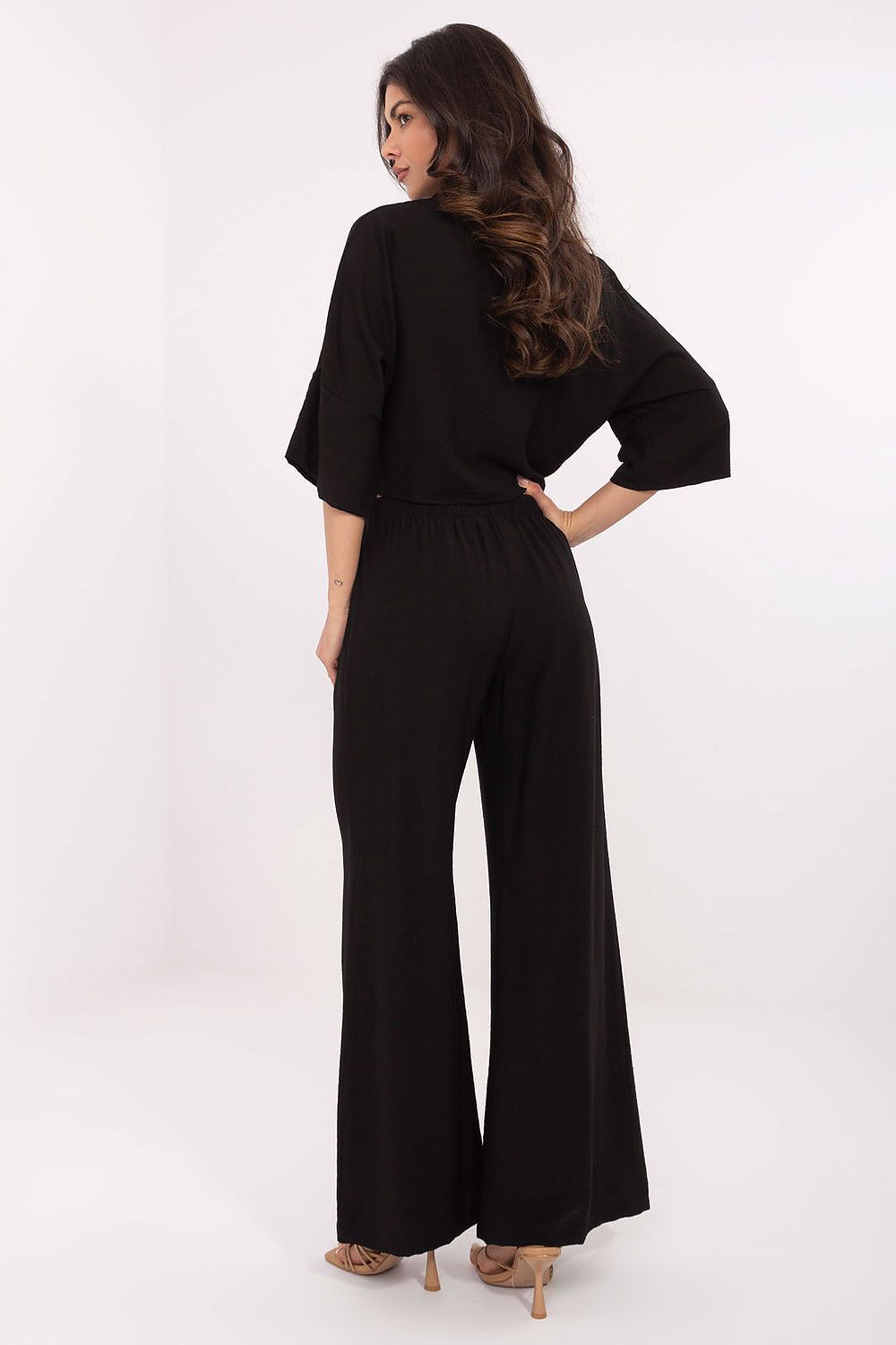 Model wearing the Och Bella Stylish Women's Set, size S, illustrating the timeless elegance and comfort of this breathable viscose-nylon ensemble for stylish daily wear.