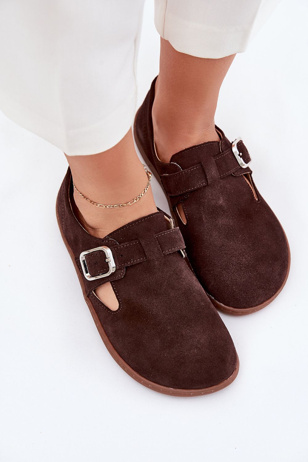 Elegant design of Step in Style barefoot shoes featuring a natural leather footbed and a flexible sole for superior walking comfort.