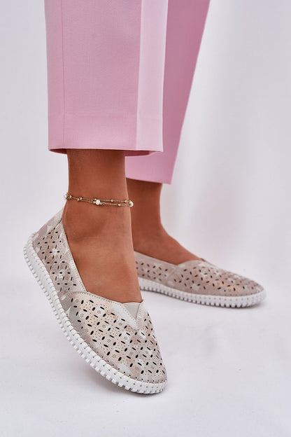 Close-up of elegant women's suede loafers by Step in Style featuring an intricate openwork design, perfect for sophisticated casual wear.