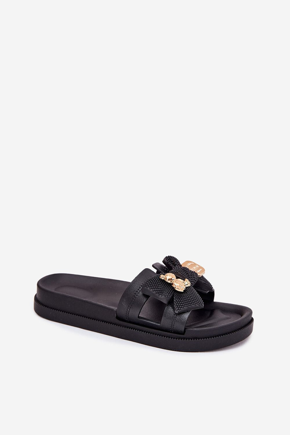 Elegant women's flip-flops by Step in style, featuring stylish cut-outs, a decorative bow, and a golden brooch, perfect for summer outfits.