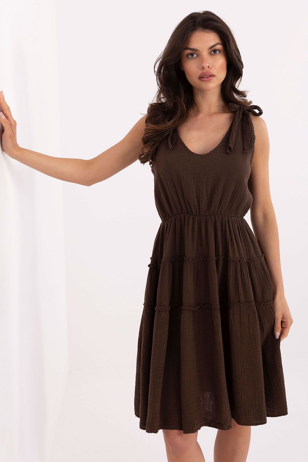 Luxurious lightweight muslin dress by Italy Moda, featuring a flared silhouette and adjustable straps, perfect for summer styling.