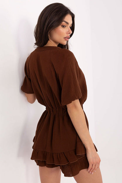 Stylish Italy Moda muslin jumpsuit in EU size 0, highlighting its soft cotton fabric and sophisticated design elements.
