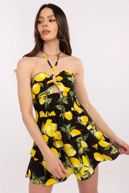Side view of Italy Moda's sophisticated flared mini dress, highlighting the feminine silhouette and lightweight fabric for effortless summer wear.
