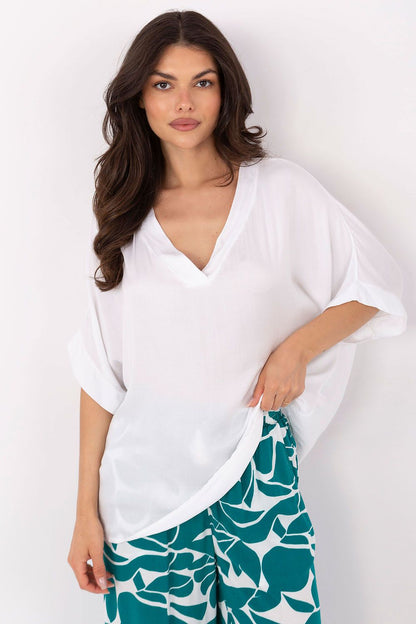 Close-up of the soft, breathable fabric of the Och Bella viscose blouse, showcasing quality craftsmanship and a luxurious texture.