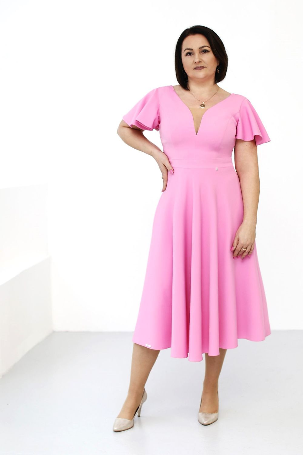 Elegant midi cocktail dress by Jersa showcasing a sophisticated mesh neckline, perfect for special occasions and available in diverse sizes EU 34-54.