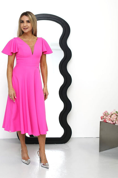 Close-up of the luxurious fabric and fitted top of the Jersa midi cocktail dress, designed for style, comfort, and a refined look.