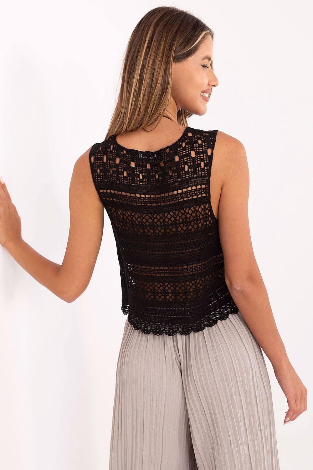 Close-up view of lace details on a bohemian cotton top by AT, perfect for stylish summer outfits and outdoor events.