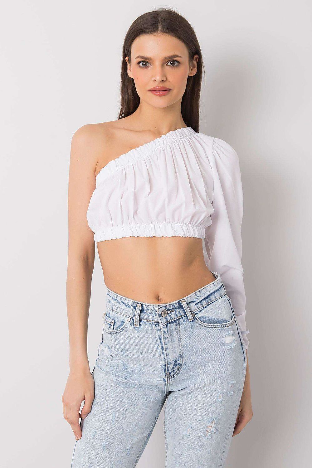 Chic Rue Paris cotton blouse with one long sleeve, perfect for pairing with high-waisted jeans or skirts for a fashionable look.