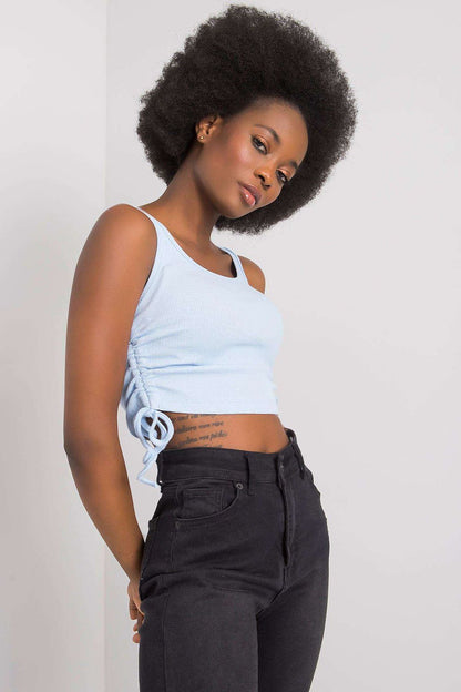 Stylish crop top in soft cotton with round neckline and adjustable straps, designed by Rue Paris for versatile casual wear.