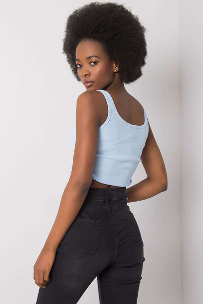 Luxurious ribbed crop top showcasing adjustable length gathers, created by Rue Paris for effortless elegance.