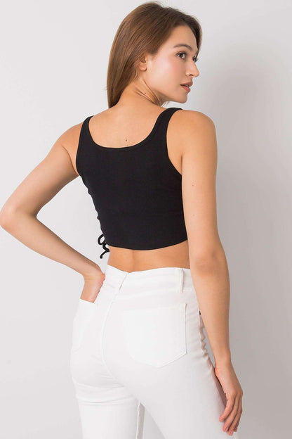 Trendy crop top in ribbed cotton from Rue Paris, featuring adjustable side gathers for a customisable silhouette, perfect for summer outings.