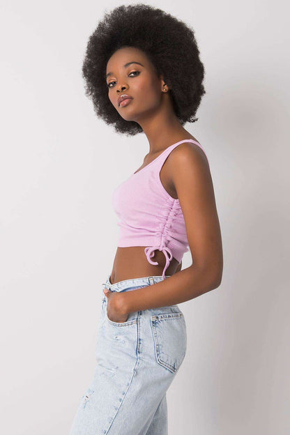 Elegant ribbed cotton crop top by Rue Paris with adjustable gathers, perfect for casual summer styling.