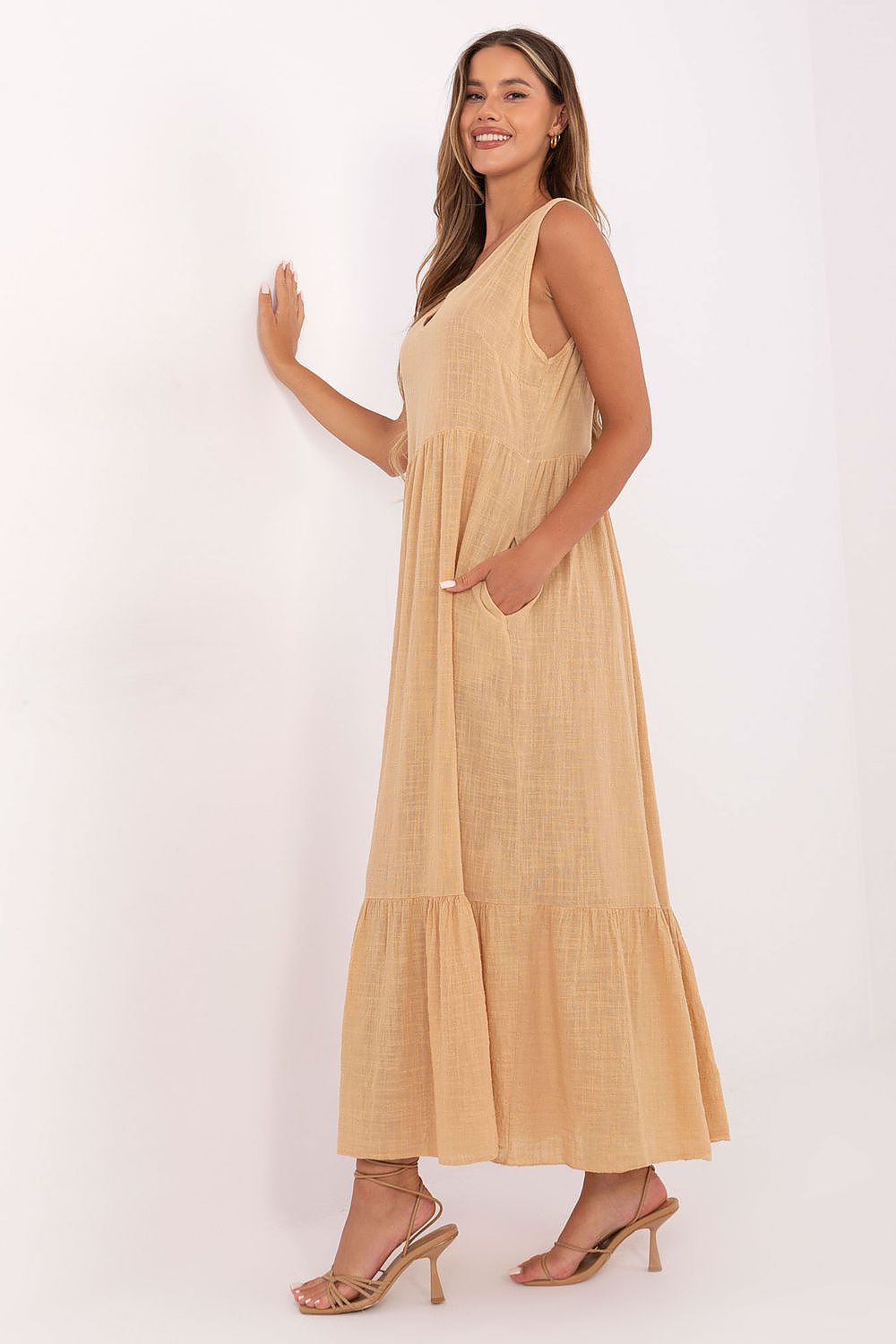 Model wearing Och Bella 100% Cotton Flared Summer Dress, accentuating the sweetheart neckline and ruffled hem, epitomising summer elegance.