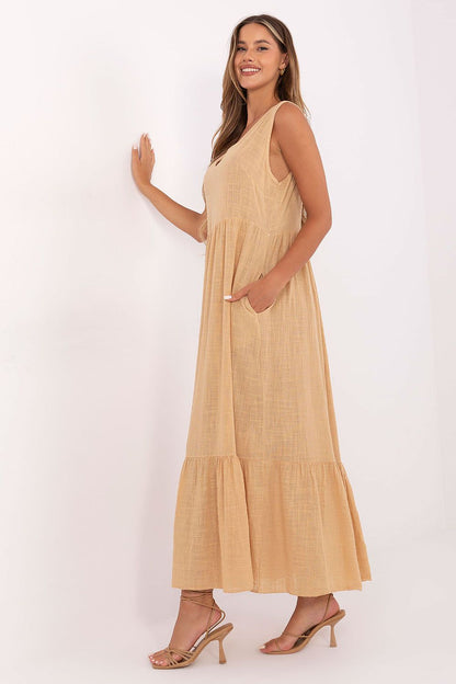 Model wearing Och Bella 100% Cotton Flared Summer Dress, accentuating the sweetheart neckline and ruffled hem, epitomising summer elegance.