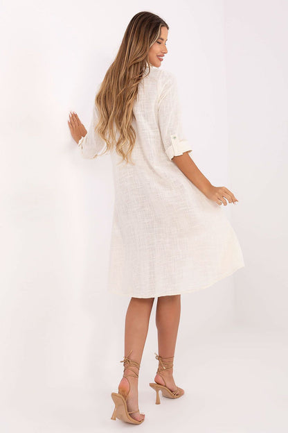 Lush lifestyle image of the Och Bella cotton summer shirt dress, capturing the effortless elegance and comfort suitable for summer occasions.