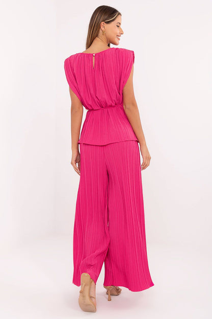Close-up of Italy Moda’s elegant women’s pleated set, highlighting the smooth texture and refined design of the high-waisted trousers and sleeveless blouse.