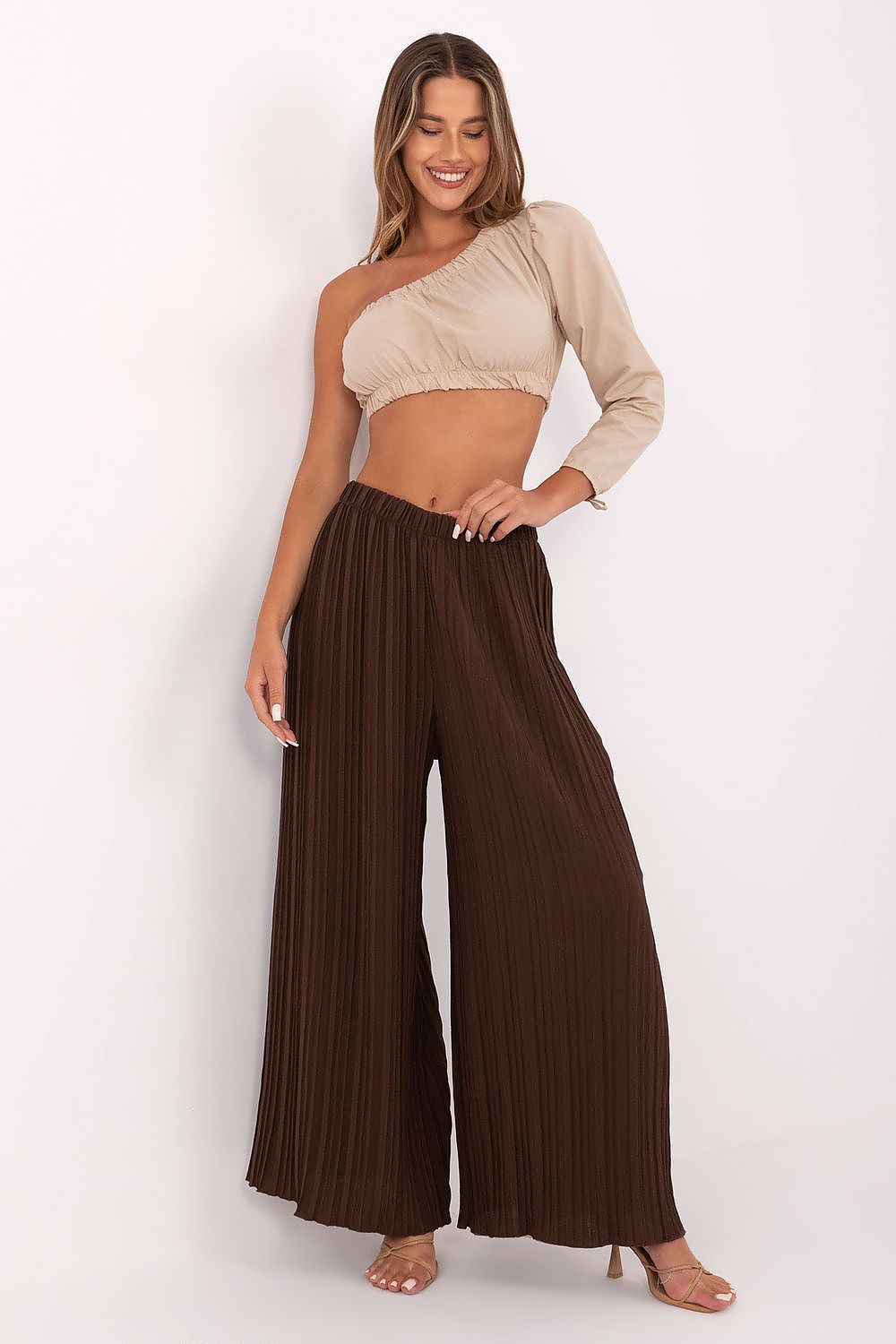 Elegant Women's High-Waist Trousers by Italy Moda, showcasing a flexible fit with wide legs, perfect for casual wear and stylish outings.