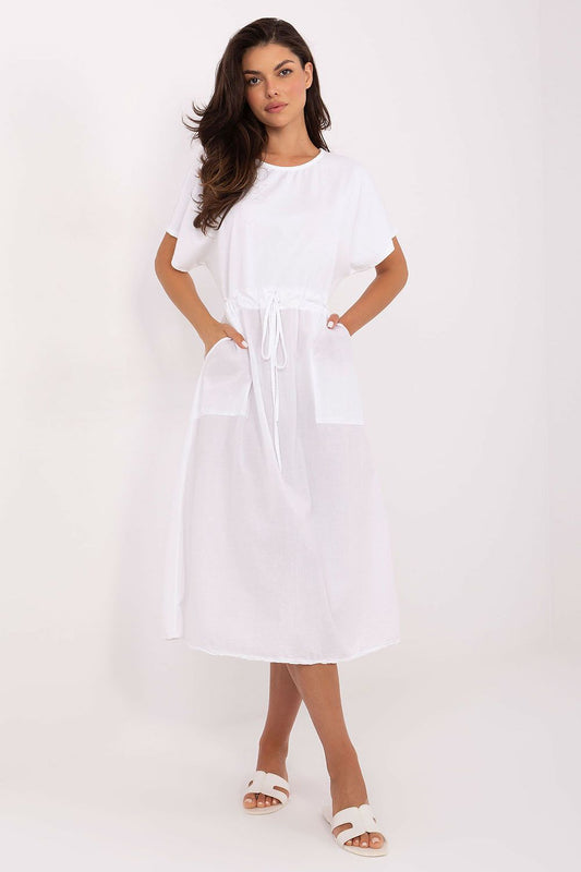 Och Bella luxurious cotton summer dress featuring a flared cut, elegant tie waist and functional pockets, ideal for chic summer outings.