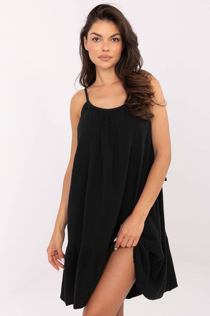 Och Bella luxurious cotton daydress for women, featuring flared above knee design, tied straps, and ruffled hem, perfect for summer outings.