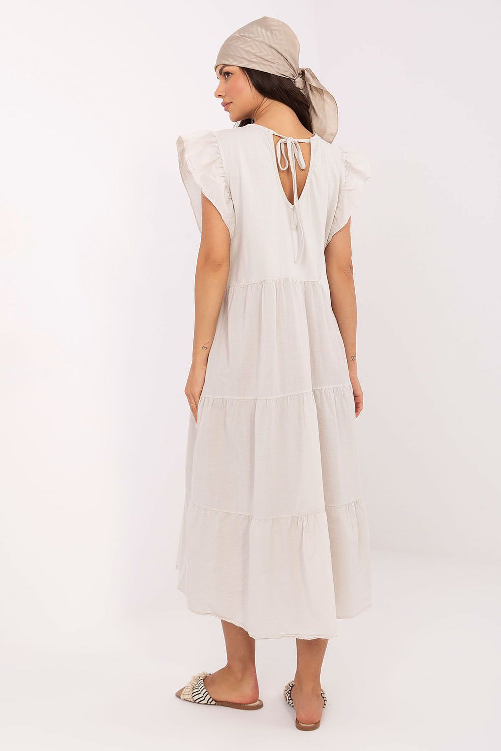 Stunning side view of Och Bella's frill sleeve midi cotton dress, showcasing the exquisite tie back and breathable fabric.