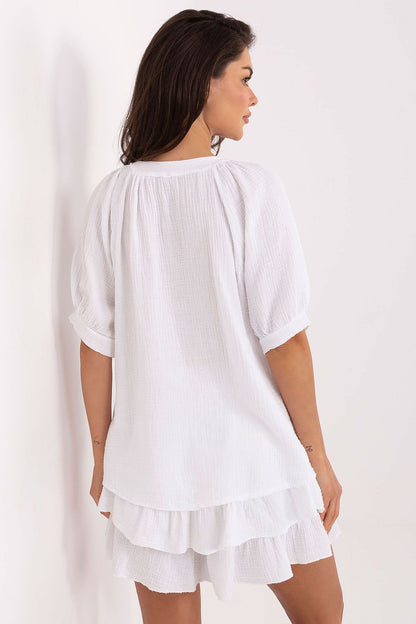 Complete Och Bella summer set showcasing a light muslin shirt and stylish ruffled shorts for an effortlessly chic look.