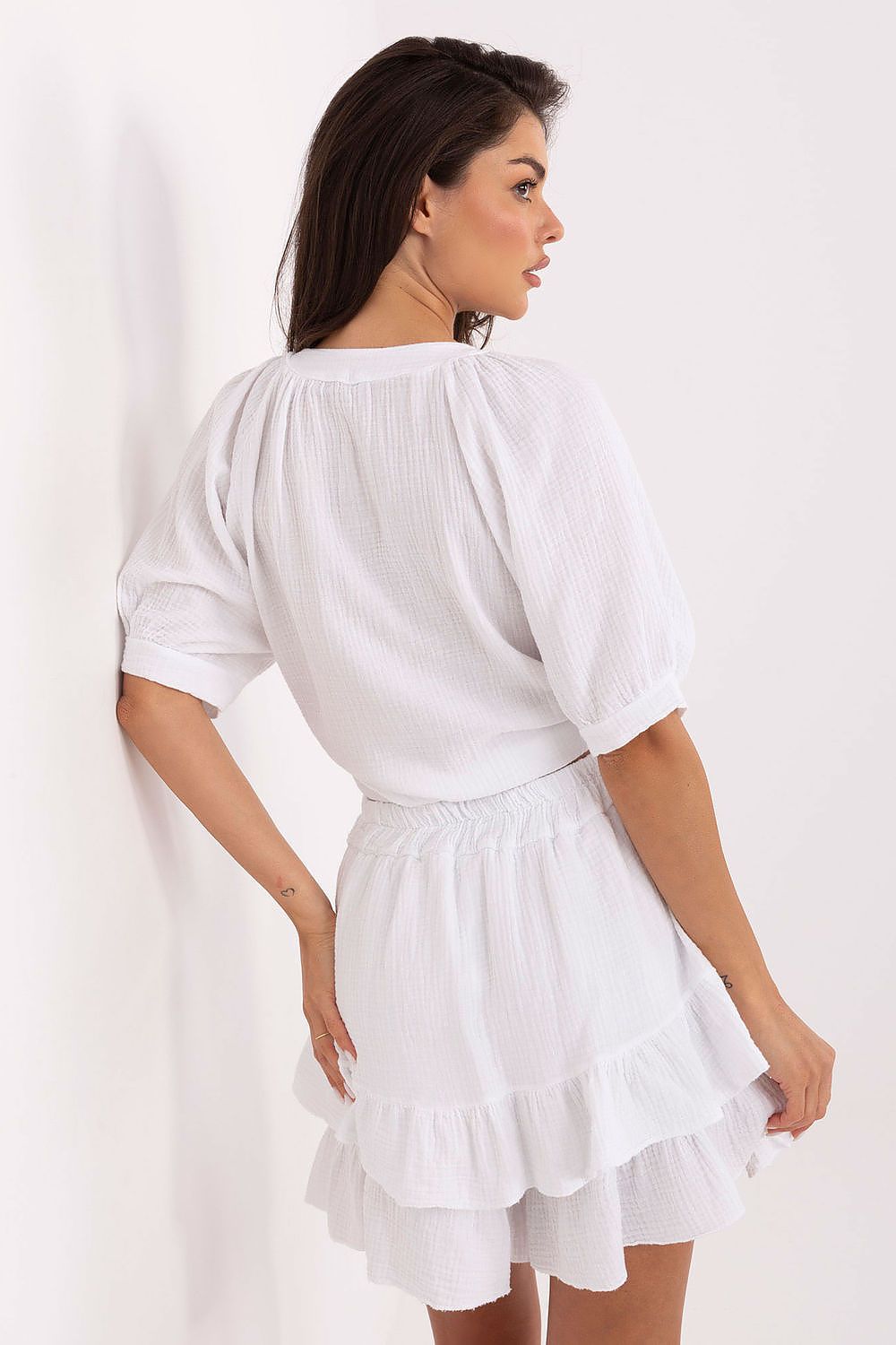 Close-up of Och Bella cotton muslin fabric, highlighting its soft texture and breathable quality, perfect for warm weather wear.