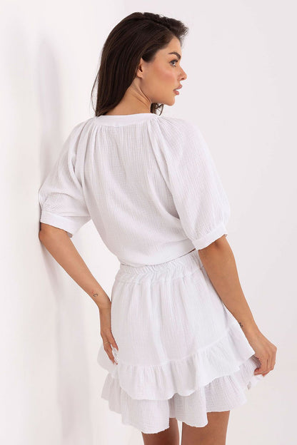 Close-up of Och Bella cotton muslin fabric, highlighting its soft texture and breathable quality, perfect for warm weather wear.