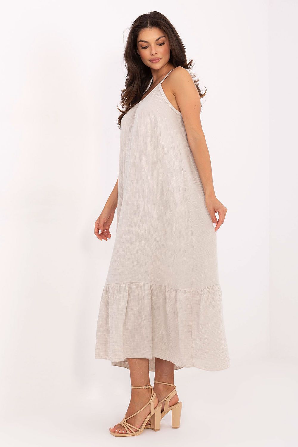 Close-up of the soft muslin cotton of the Och Bella Women's Midi Dress, showcasing the airy texture and luxurious feel ideal for warm days.