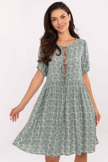 Close-up view of Sublevel's Summer Flare Dress, showcasing the delicate round neckline and short sleeves made from comfortable viscose.