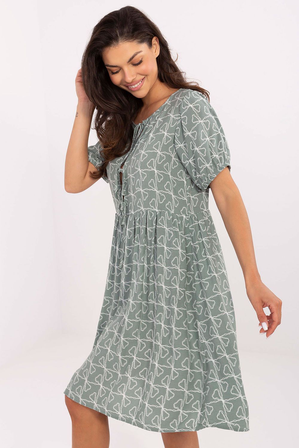 Model wearing Sublevel's stunning Summer Flare Dress in vibrant summer print, ideal for stylish casual wear during hot days.