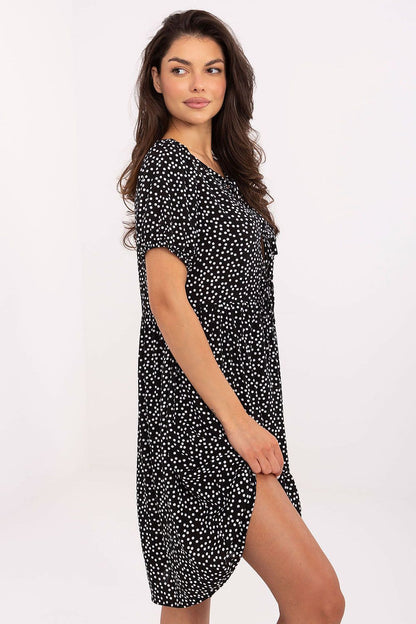 Elegant summer flare dress by Sublevel, crafted from luxurious viscose. This breathable dress features a charming tie detail at the front, short sleeves, and a flattering silhouette ideal for warm-weather outings.