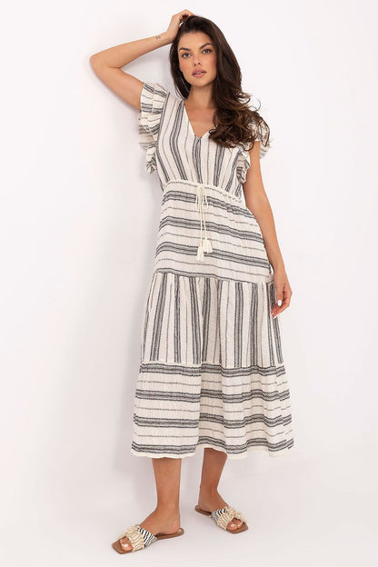 Stylish Och Bella Midi Daydress showcasing a flared cut and feminine design, ideal for casual summer wear.