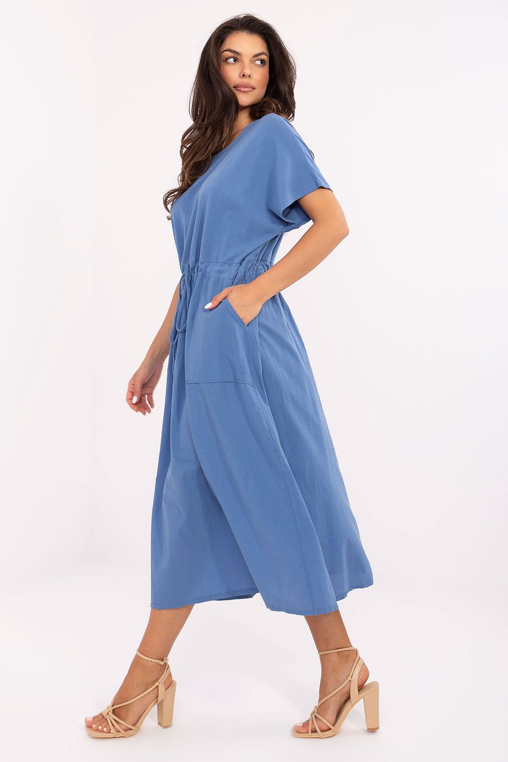 Och Bella luxurious cotton summer dress featuring a flared cut, elegant tie waist, and convenient slip-in pockets, perfect for a chic summer style.