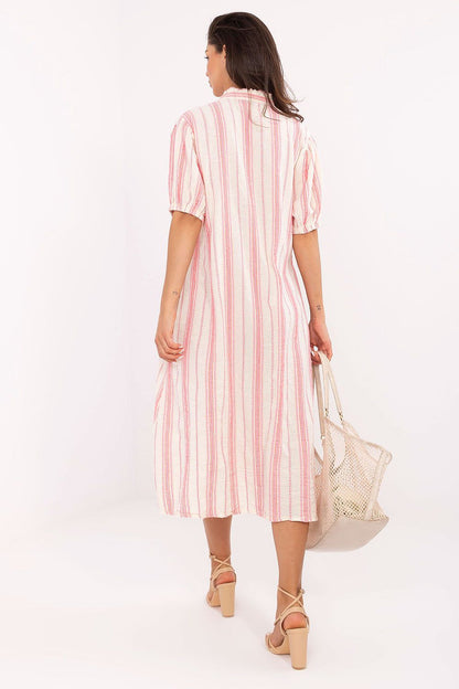 Detail of the Boho Midi Dress by Och Bella, featuring a stylish button-up design, short sleeves, and chic pockets, ideal for a sophisticated relaxed look.